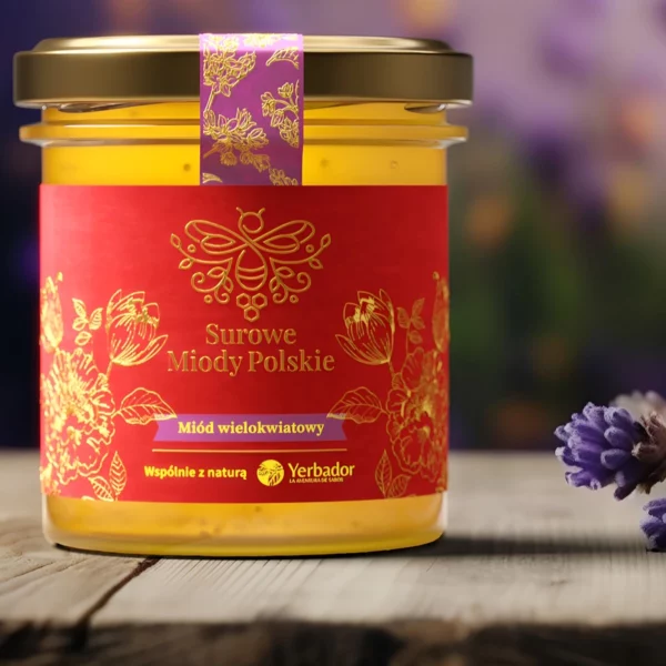 Jar of Yerbador Raw Multiflower Honey with a label on a wooden table