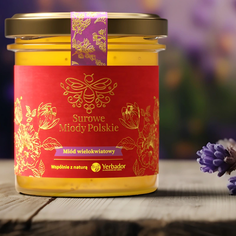2-honey-multiflower-honey-certified-natural-no-sugar-highest-quality Jar of Yerbador Raw Multiflower Honey with a label on a wooden table