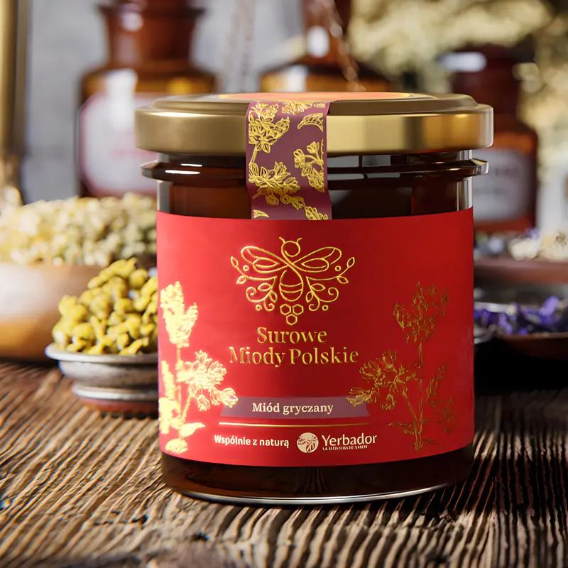 4-buckwheat-phacelia-chestnut-best-honeys-certified-natural-no-sugar-highest-quality Jar of Yerbador Raw Buckwheat Honey among dried herbs on a wooden table