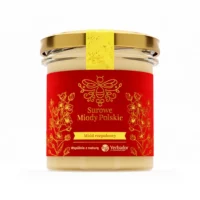 Jar of Yerbador Raw Rapeseed Honey among white daisies