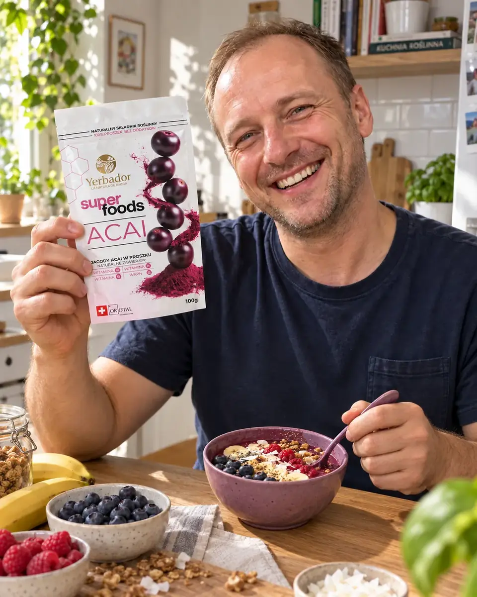 Laughing man having breakfast with an açaí bowl and Yerbador açaí package