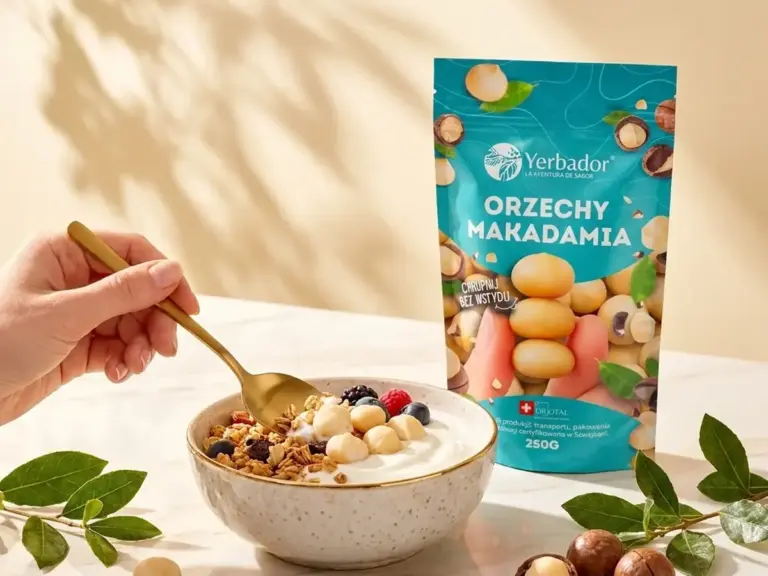 Bowl of yogurt with granola, fruit and macadamia, next to a pack of Yerbador nuts