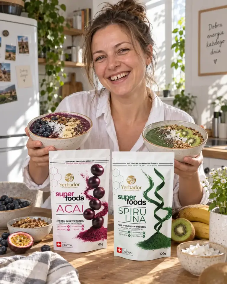Woman in the kitchen with two bowls and packs of açaí and spirulina