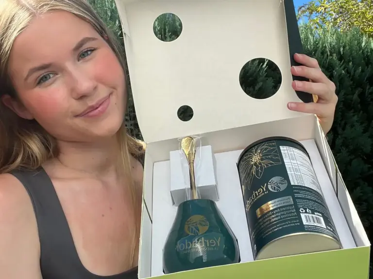 Girl showing an open Yerbador gift set